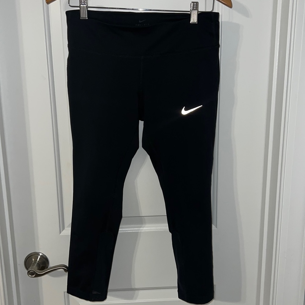 Nike dry fit all black legging with zipper pocket in back